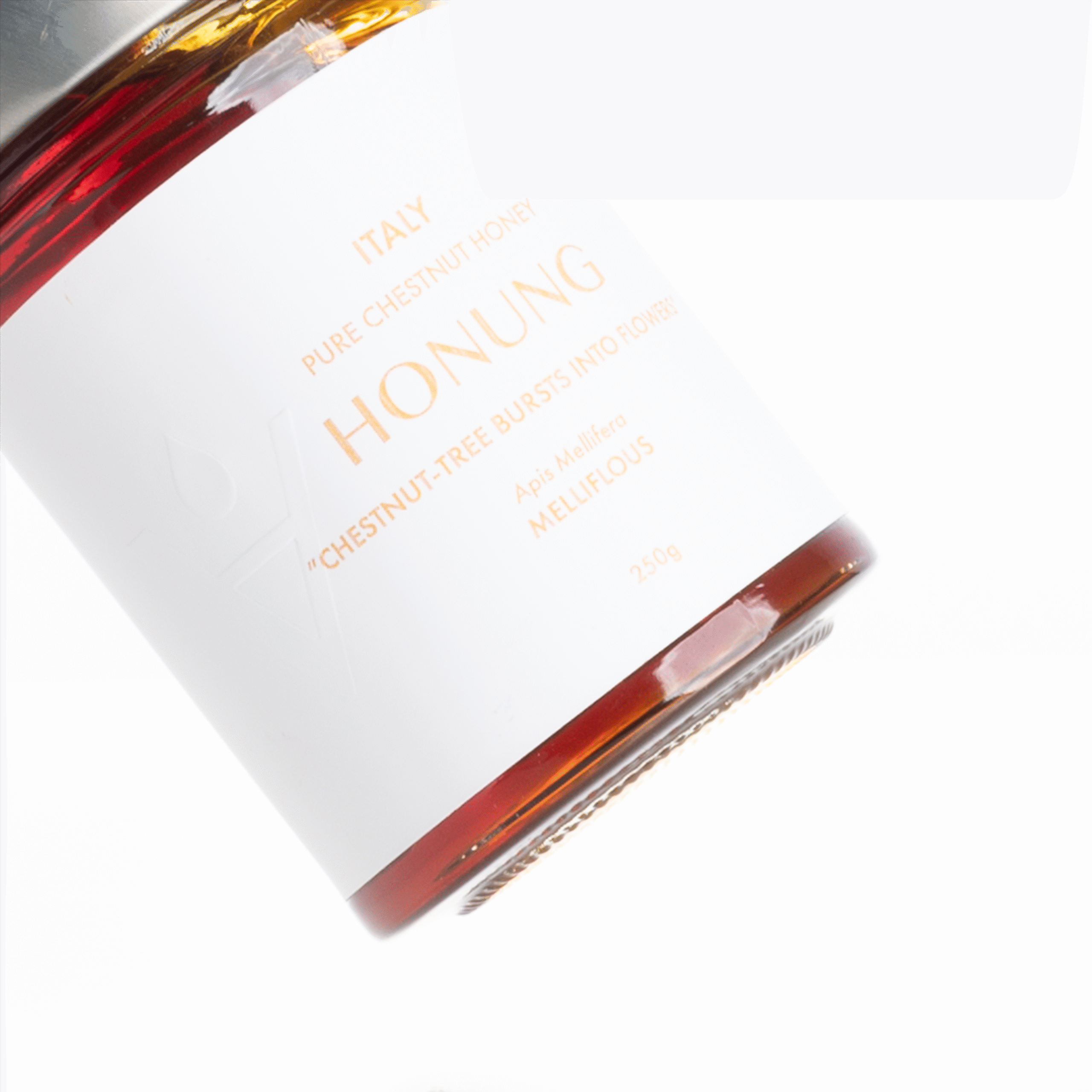 Chestnut honey from the side